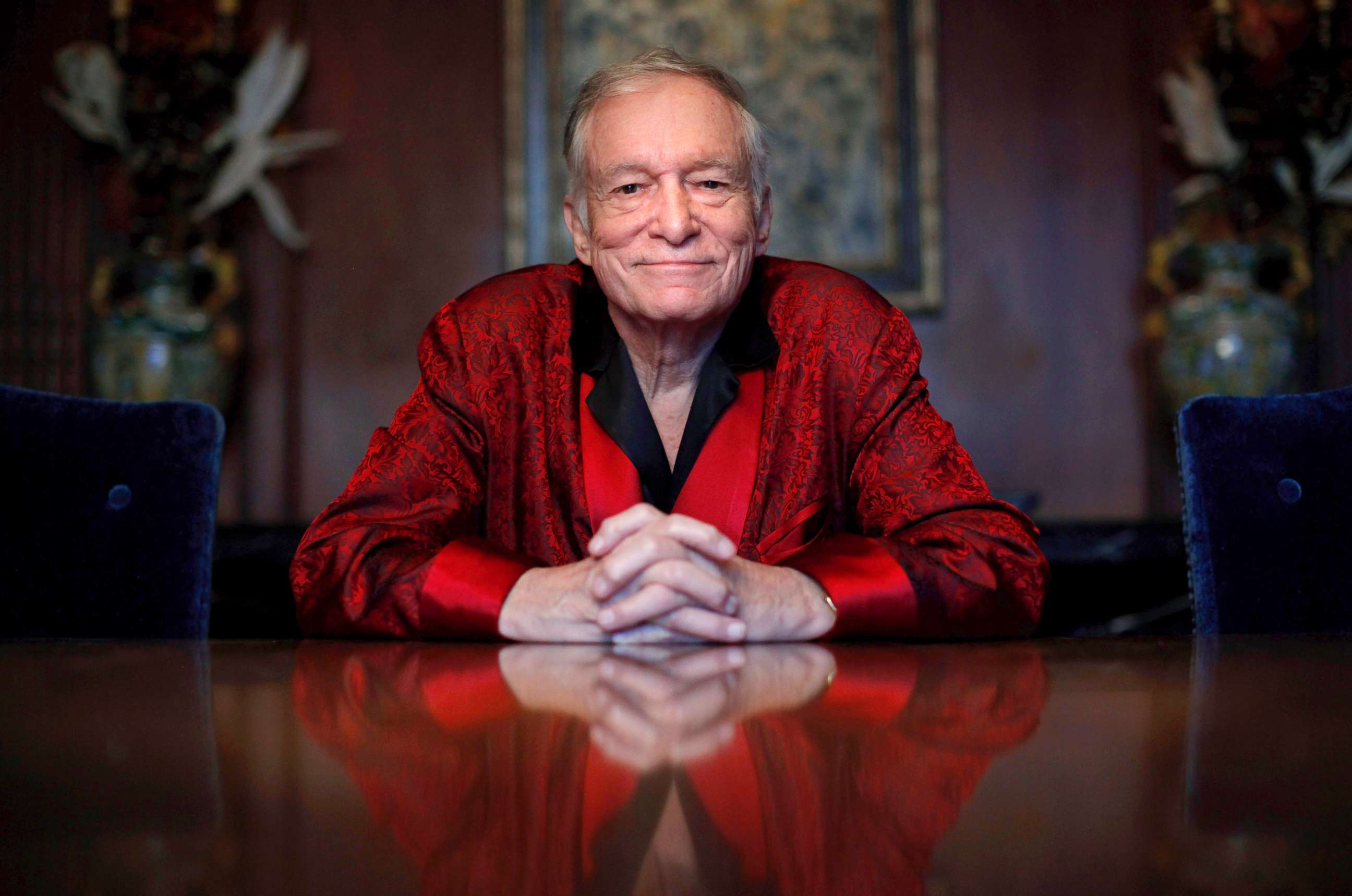 PHOTO: Playboy magazine founder Hugh Hefner poses for photos at the Playboy Mansion in Los Angeles, Nov. 4, 2010. 