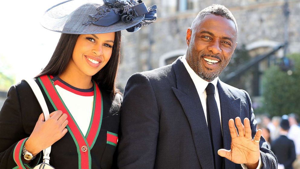 PHOTO: Idris Elba and Sabrina Dhowre arrives at St George's Chapel at Windsor Castle for the wedding of Meghan Markle and Prince Harry, May 19, 2018, in London. 