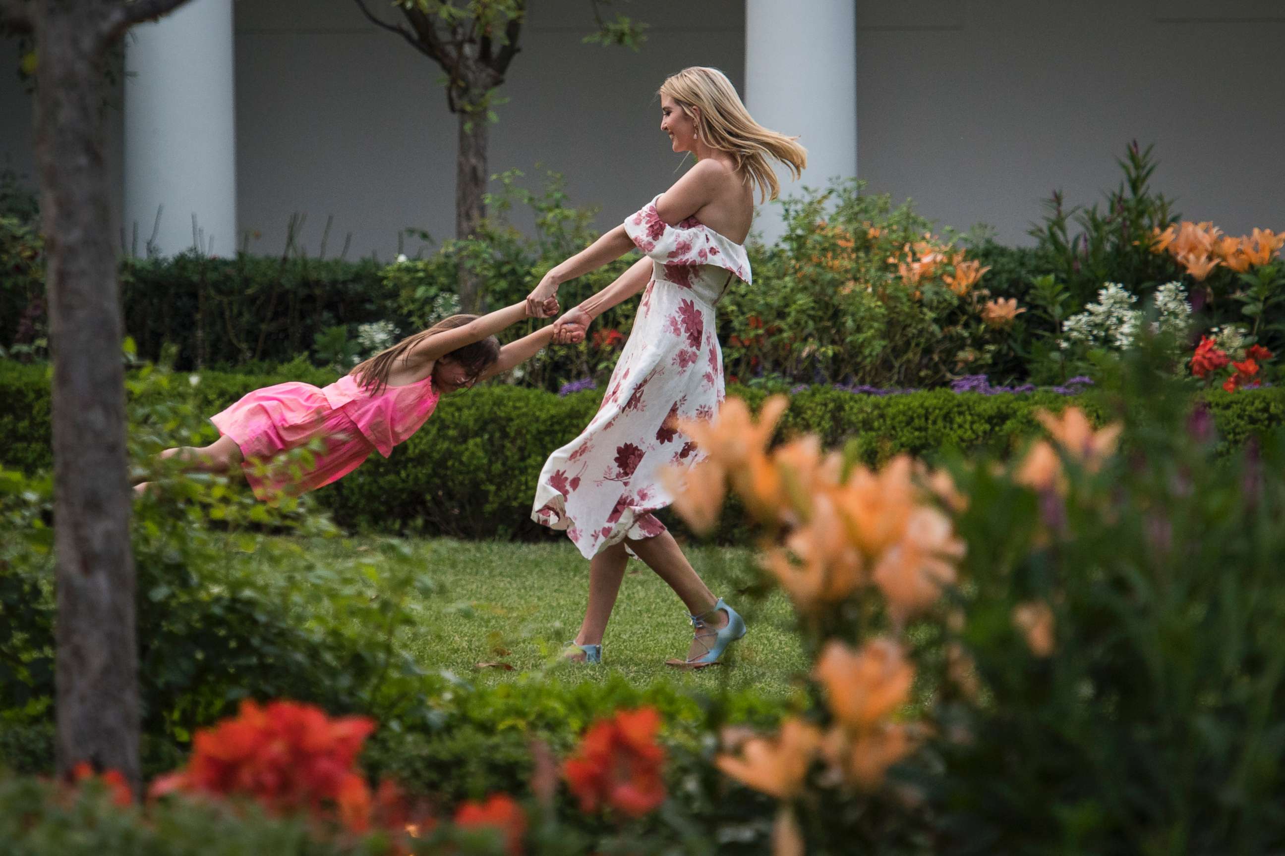 PHOTO: Ivanka Trump swings her daughter Arabella Rose Kushner in the Rose Garden of the White House in Washington, June 22, 2017.