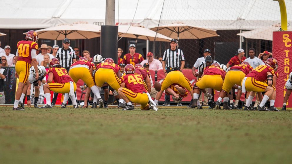PHOTO: USC long snapper Jake Olson, who has been blind since the age of 12, snaps an extra point attempt.