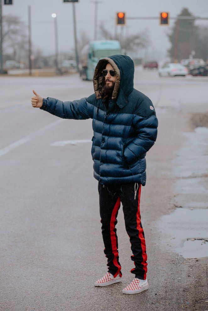 PHOTO: Jared Leto, frontman of Thirty Seconds to Mars, attempts to hitch a ride during his "Mars Across America" tour, April 3, 2018.