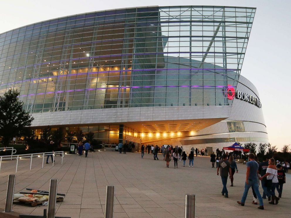 PHOTO: People stream into the BOK Center for the country star Jason Aldean concert in Tulsa, Okla., Thursday, Oct. 12, 2017.