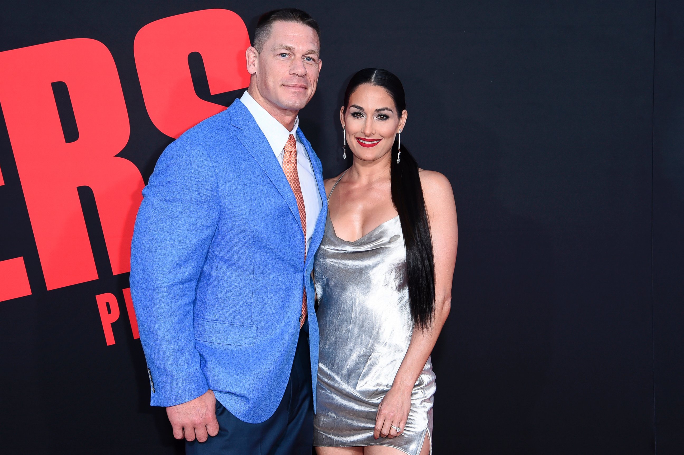 In this Tuesday, April 3, 2018, photo, John Cena, left, and Nikki Bella attend the LA Premiere of "Blockers" at the Regency Village Theatre in Los Angeles. 