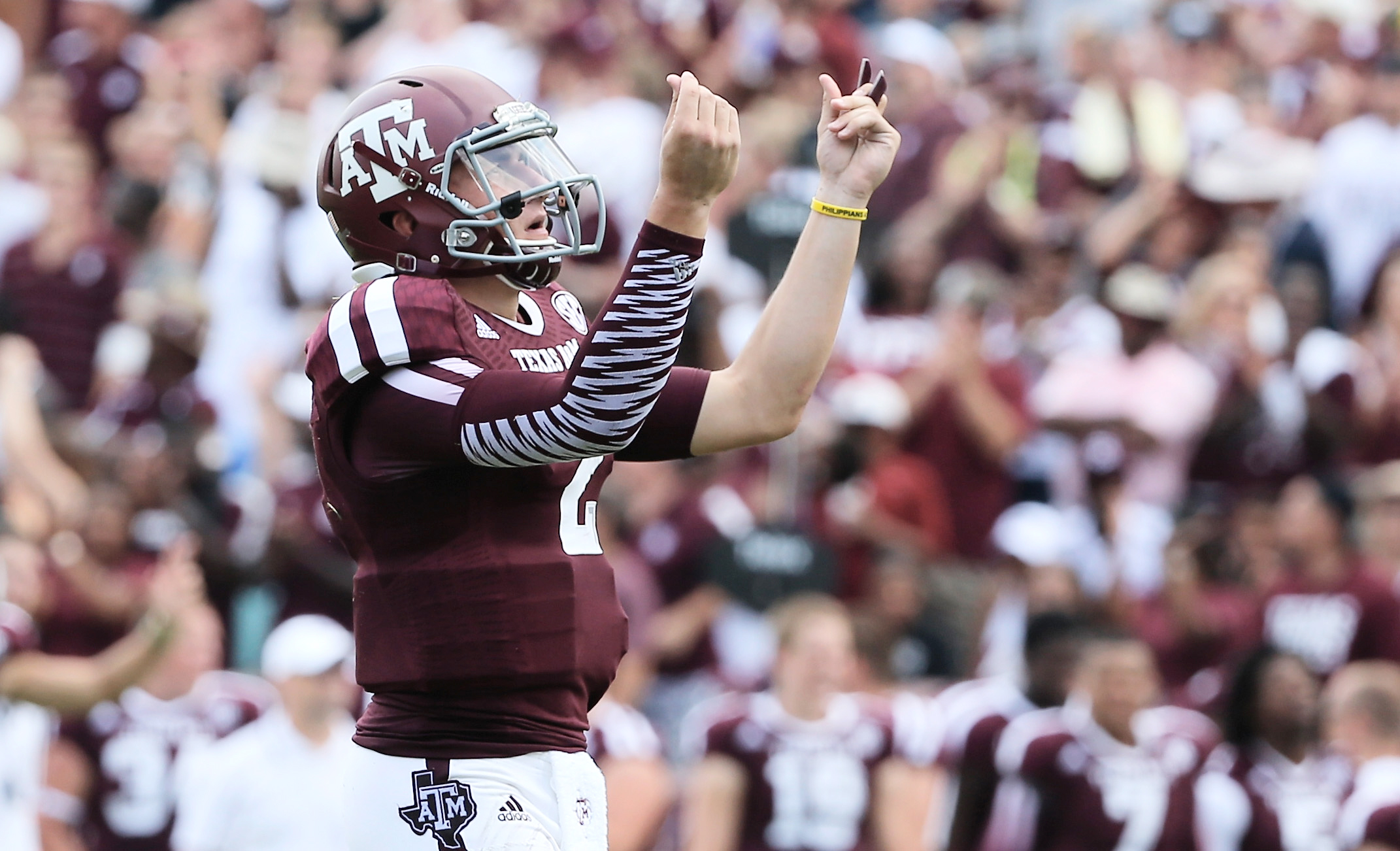 PHOTO: Johnny Manziel #2 of the Texas A&M Aggies celebrates a third quarter touchdown during the game against the Rice Owls at Kyle Field in this Aug. 31, 2013 file photo in College Station, Texas.