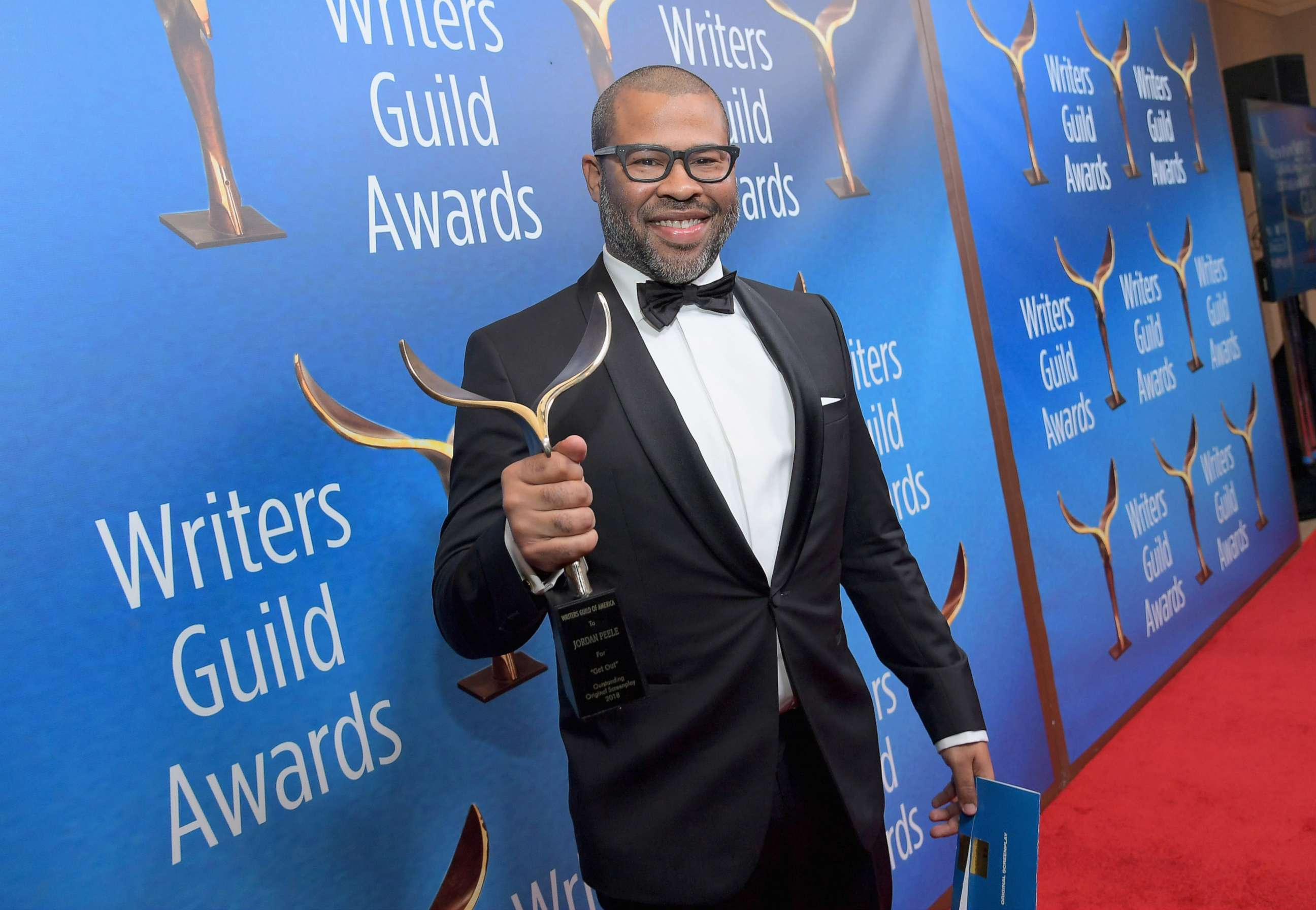 PHOTO: Writer/actor/director Jordan Peele poses with 'Original Screenplay' award for 'Get Out' during the 2018 Writers Guild Awards L.A. Ceremony at The Beverly Hilton Hotel, Feb. 11, 2018 in Beverly Hills, Calif.
