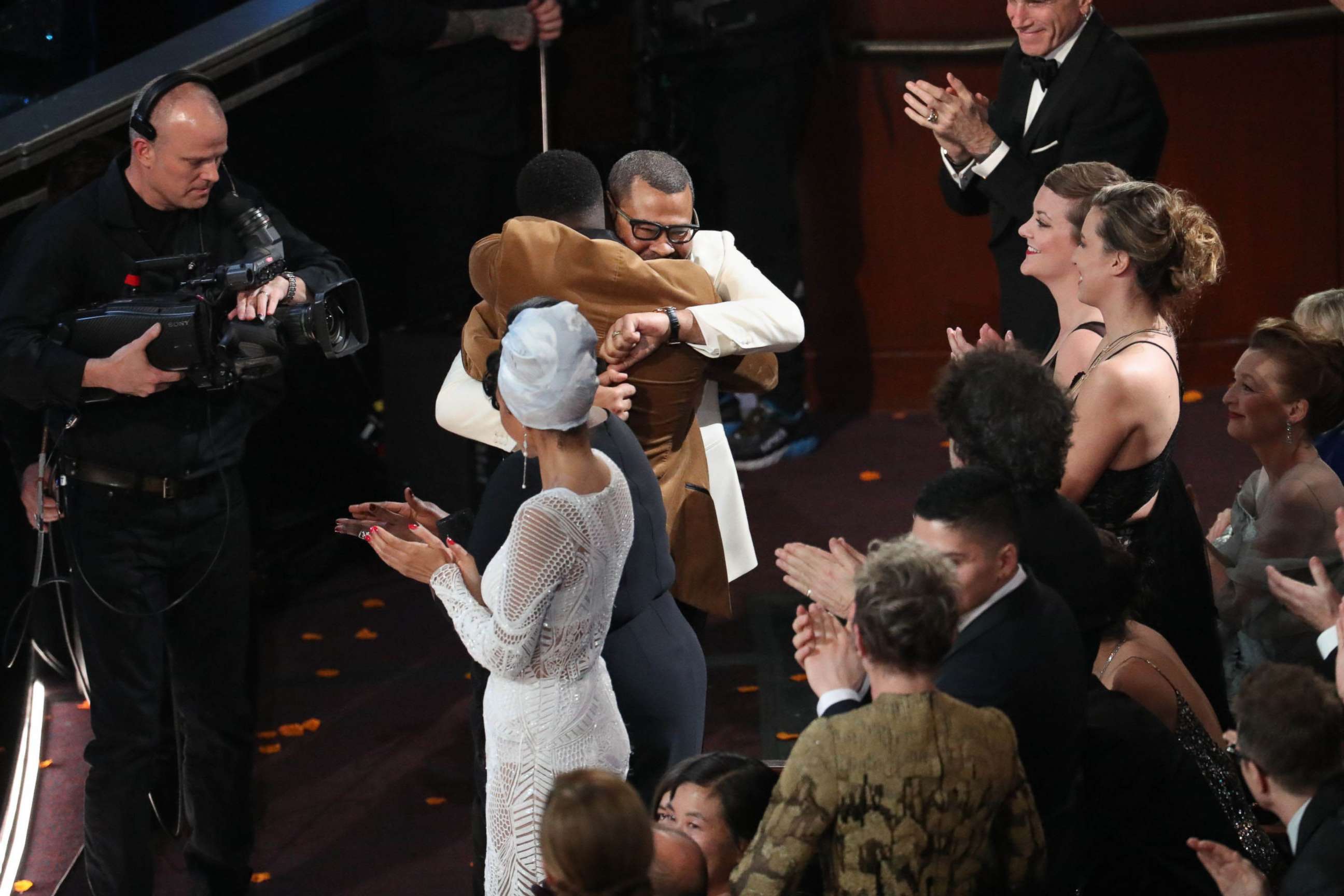 PHOTO: Jordan Peele hugs Daniel Kaluuya after winning the Oscar for best original screenplay for "Get Out" during the 90th Academy Awards at the Dolby Theater in Los Angeles, March 4, 2018.
