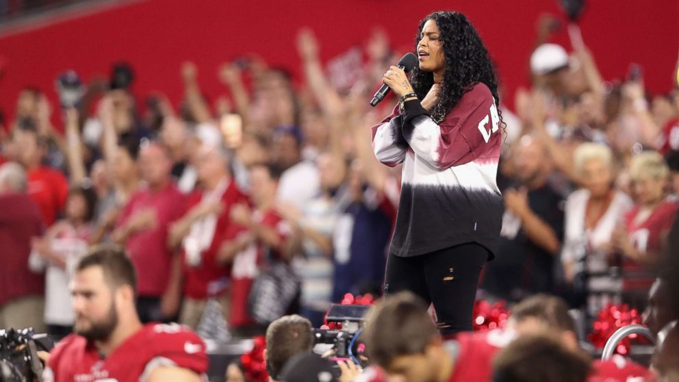 Singer Jordin Sparks performs the National Anthem before the start of the  the NFL game between the Arizona Cardinals and the Dallas Cowboys at the University of Phoenix Stadium, Sept. 25, 2017, in Glendale, Ariz.  