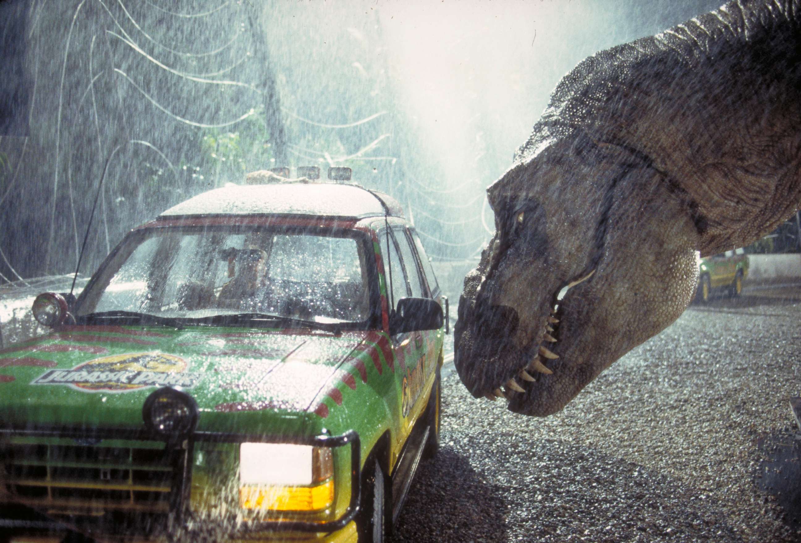 PHOTO: A Tyrannosaurus Rex menaces the theme park's first customers in a scene from the film 'Jurassic Park', 1993.