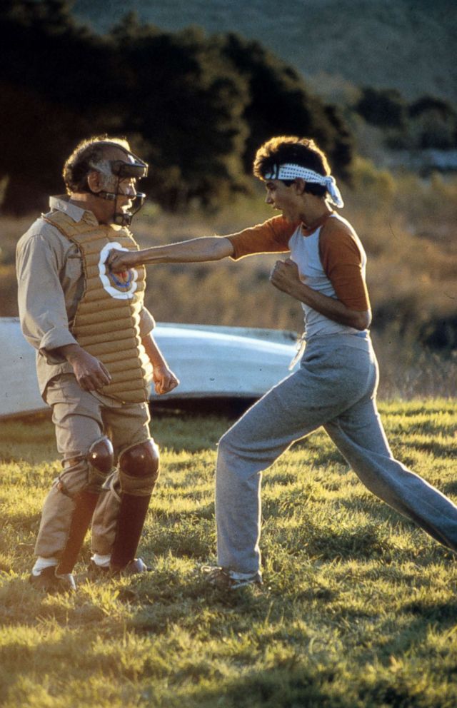 PHOTO: Ralph Macchio punches Pat Morita in a scene from the film 'The Karate Kid,' 1984.