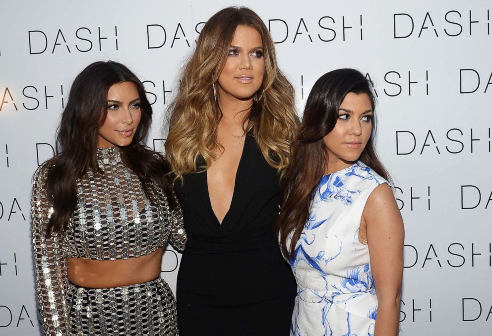 PHOTO: From left, Kim Kardashian, Khloe Kardashian and Kourtney Kardashian attend the opening of DASH Miami Beach, March 12, 2014 in Miami Beach, Fla.