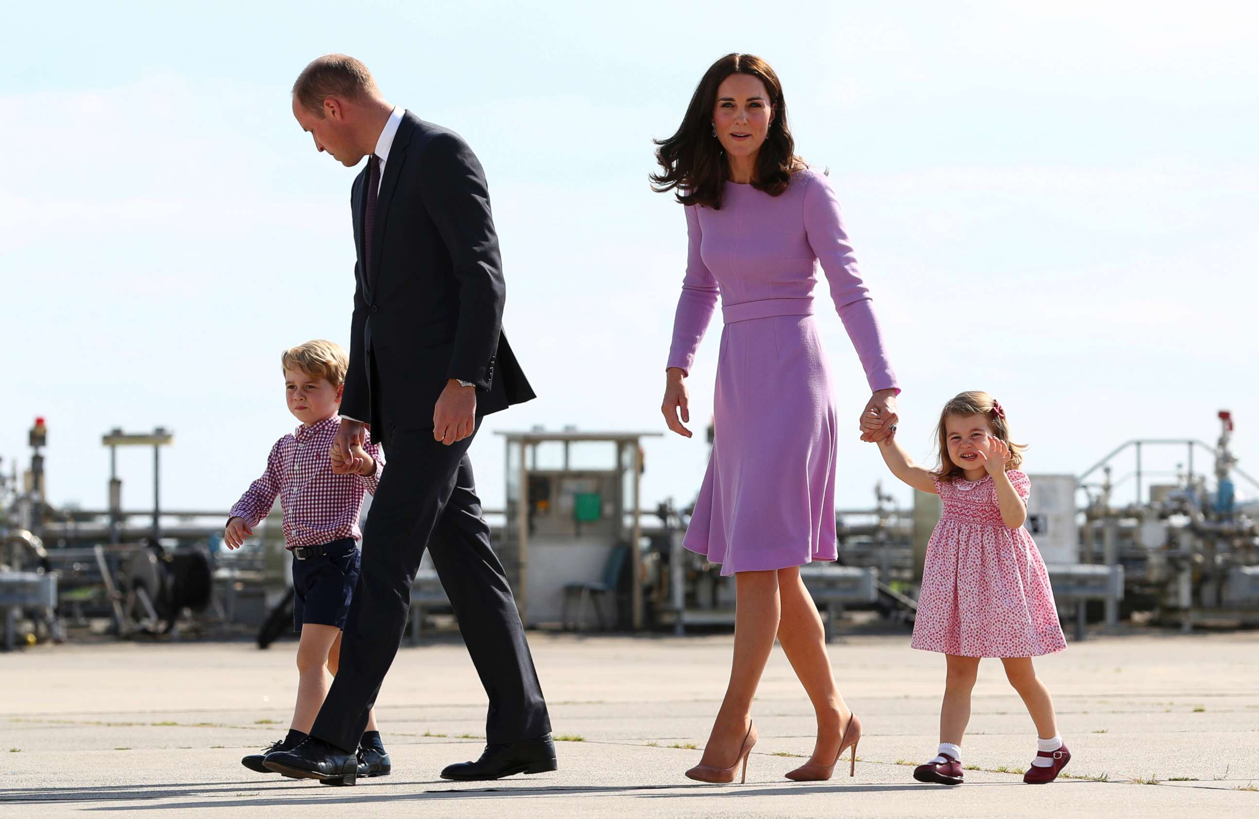 PHOTO: Britain's Prince William and his wife Kate, the Duchess of Cambridge, and their children, Prince George and Princess Charlotte, are pictured before boarding a plane in Hamburg, Germany, July 21, 2017.