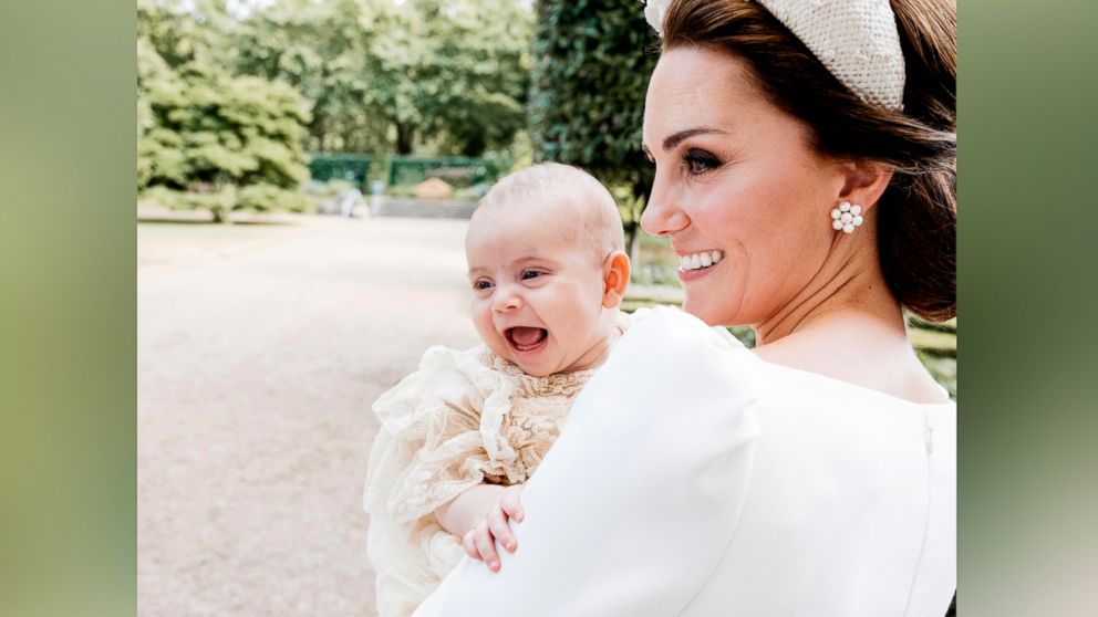 PHOTO: Kate Middleton, the Duchess of Cambridge poses for a photo with Prince Louis in the garden of Clarence House, following Prince Louis's baptism at the Chapel Royal, St. James's Palace, in London, July 9, 2018.