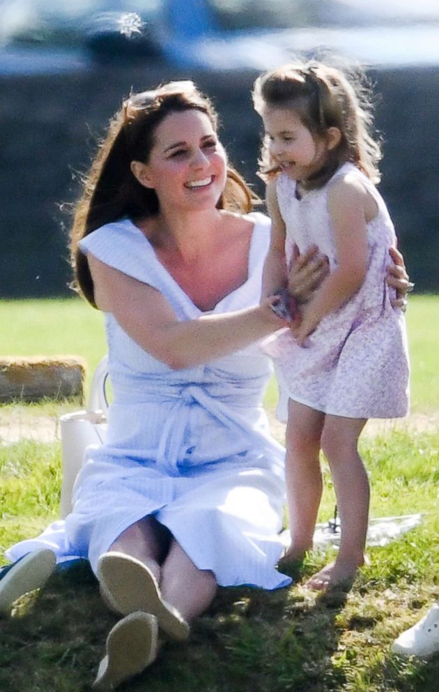 PHOTO: Catherine, Duchess of Cambridge and Princess Charlotte of Cambridge attend the Maserati Royal Charity Polo Trophy at the Beaufort Polo Club, June 10, 2018, in Gloucester, England.