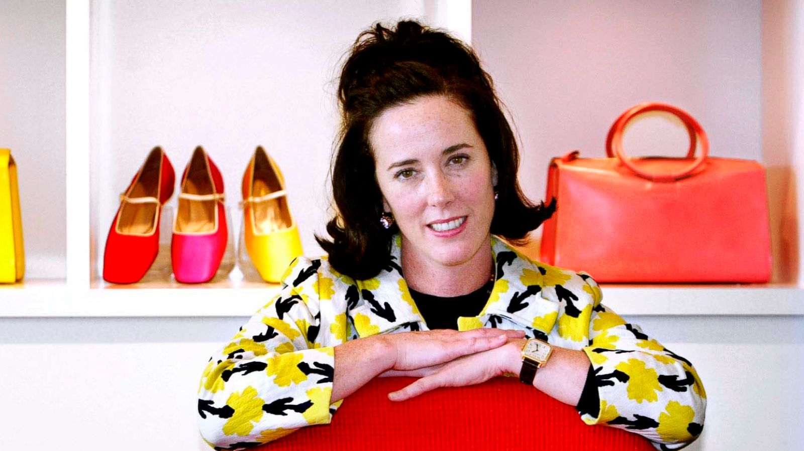 PHOTO: In this May 13, 2004 file photo, designer Kate Spade poses with handbags and shoes from her next collection in New York.