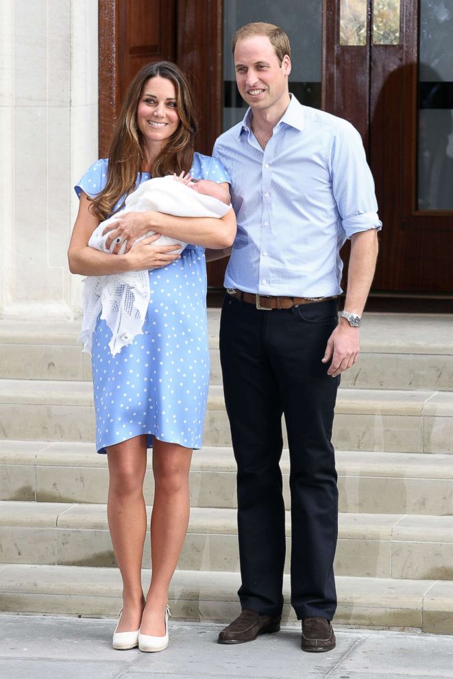 PHOTO: Prince William, Duke of Cambridge, Catherine, Duchess of Cambridge and their newborn son George depart St. Mary's Hospital on July 23, 2013 in London.