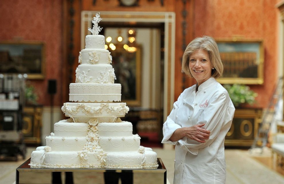 PHOTO: Fiona Cairns stands next to the Royal Wedding cake that she and her team made for Prince William and Kate Middleton in London, April, 29, 2011. 