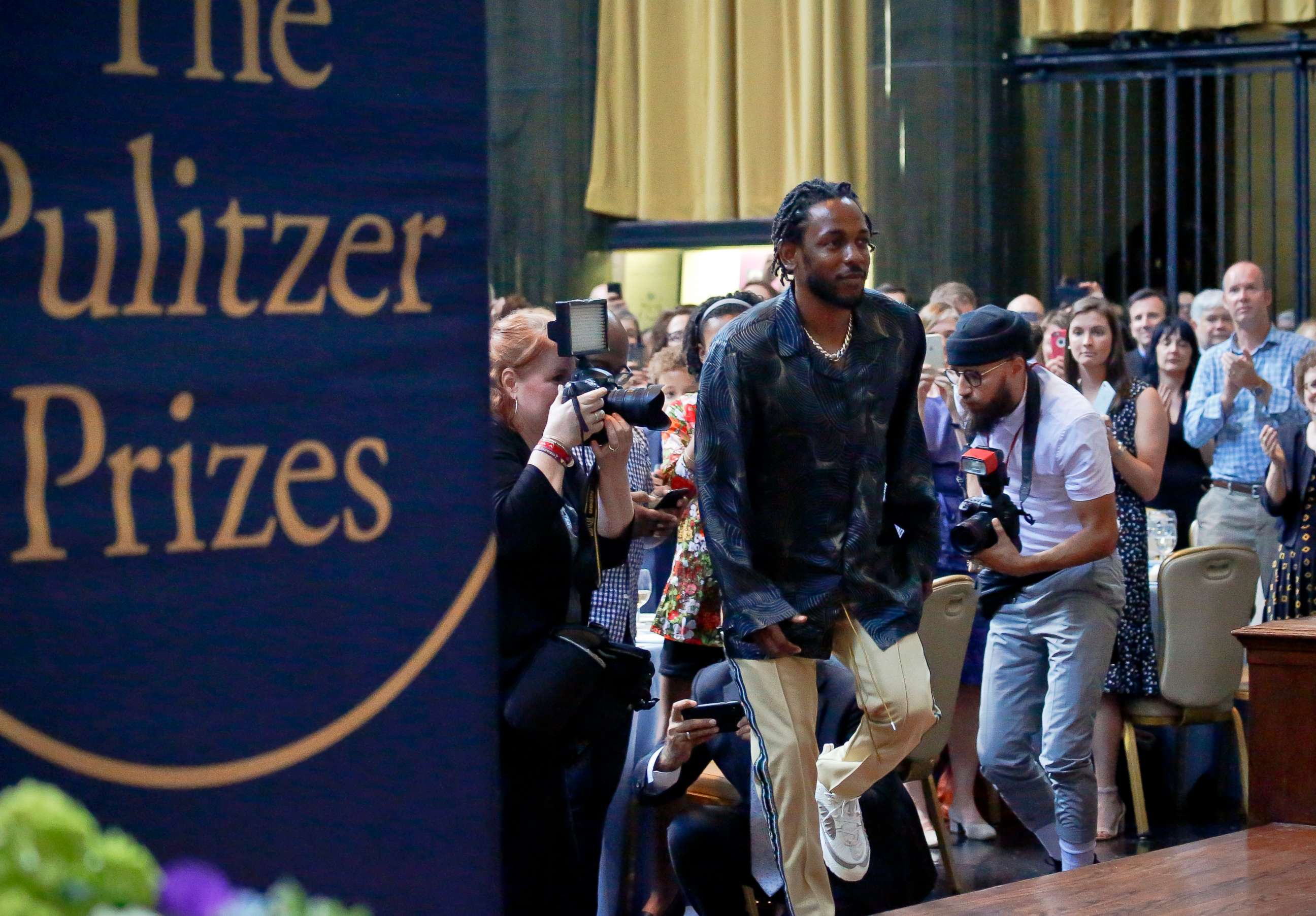 PHOTO: Pulitzer Prize winner for music Kendrick Lamar walks onto the stage to accept his award for his album "DAMN," during the 2018 Pulitzer Prize awards luncheon at Columbia University, May 30, 2018, in New York.