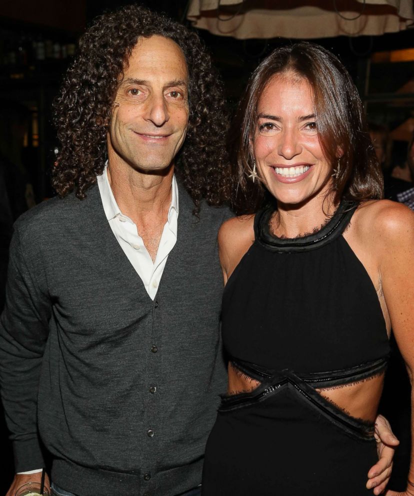 PHOTO: Divorce Attorney Laura Wasser (R) and musician Kenny G attend Laura Wasser's Book Party, Oct. 8, 2013, in West Hollywood, Calif.