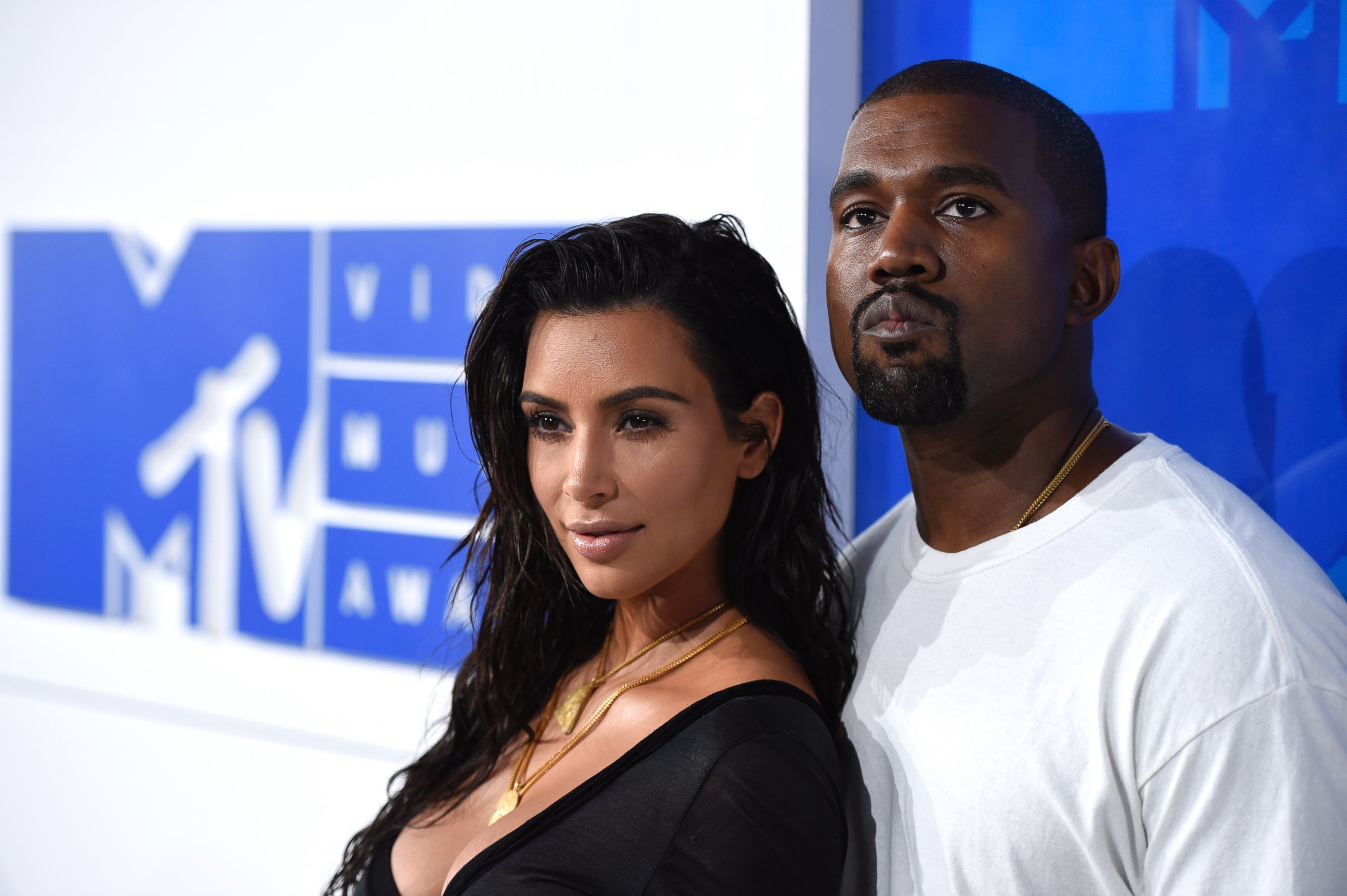 In this Aug. 28, 2016 file photo, Kim Kardashian West, left, and Kanye West arrive at the MTV Video Music Awards in New York.