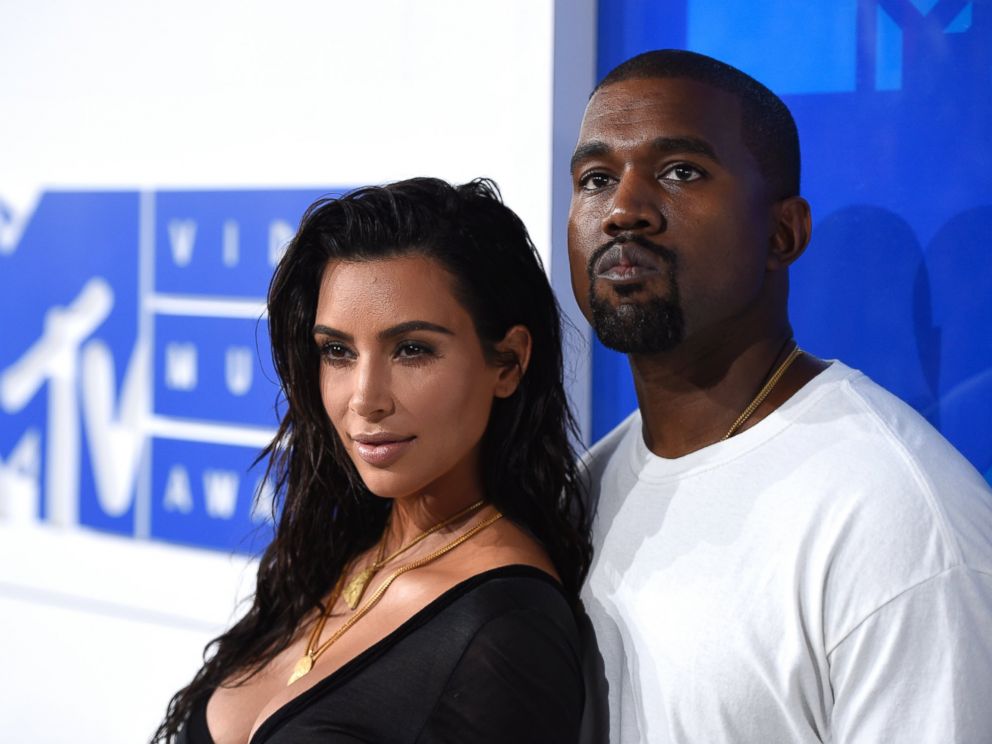 In this August 28, 2016 archive photo, Kim Kardashian West, left, and Kanye West arrive at the MTV Video Music Awards in New York.