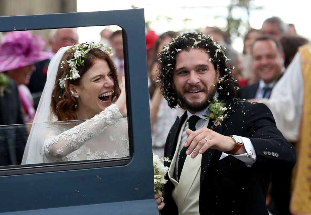 PHOTO: Kit Harington and Rose Leslie react as they leave after their wedding ceremony, at Rayne Church, Kirkton of Rayne in Aberdeenshire, Scotland, June 23, 2018.