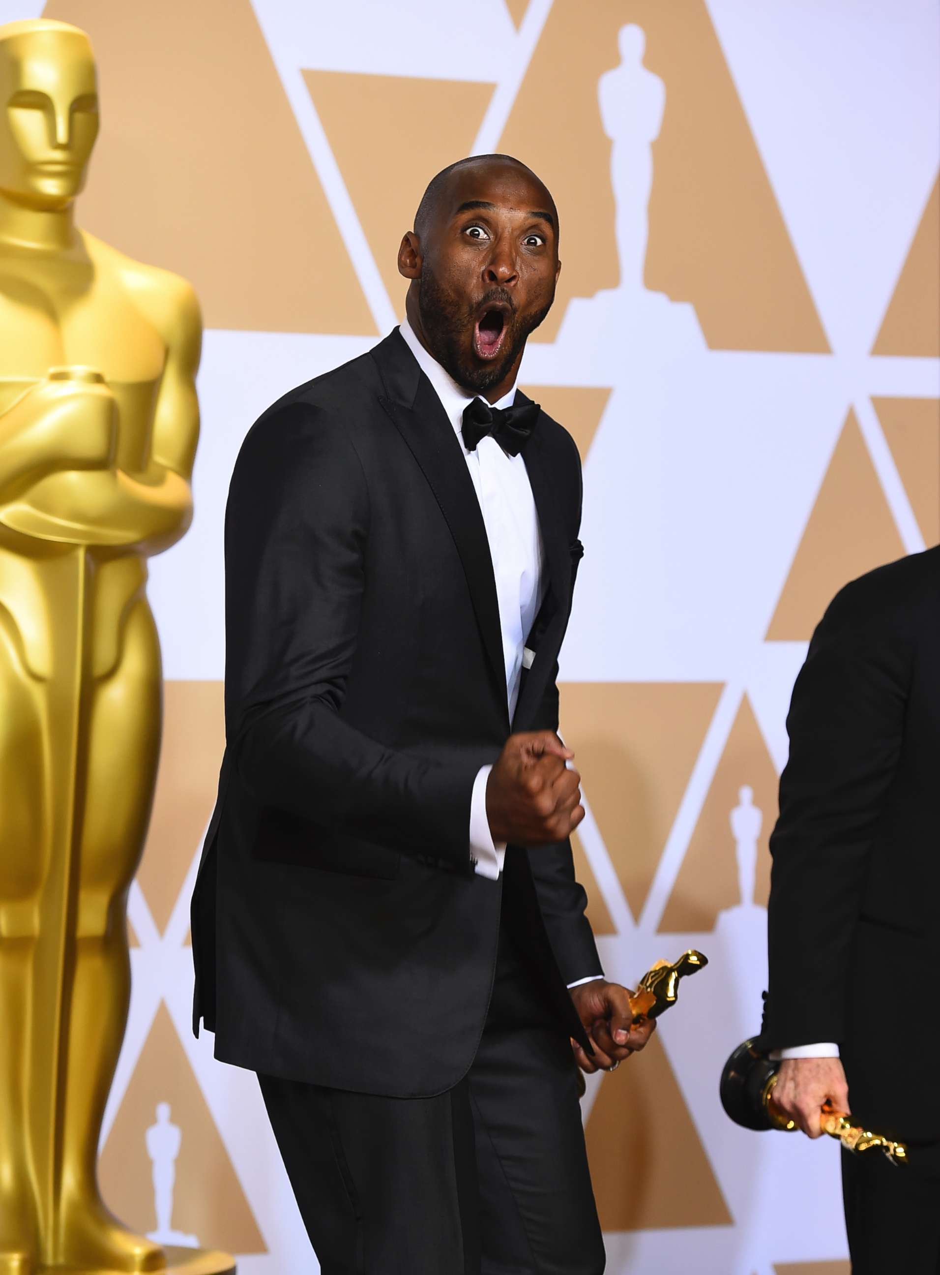 PHOTO: Kobe Bryant, winner of the award for best animated short for "Dear Basketball", celebrates in the press room at the Oscars, March 4, 2018, at the Dolby Theatre in Los Angeles.
