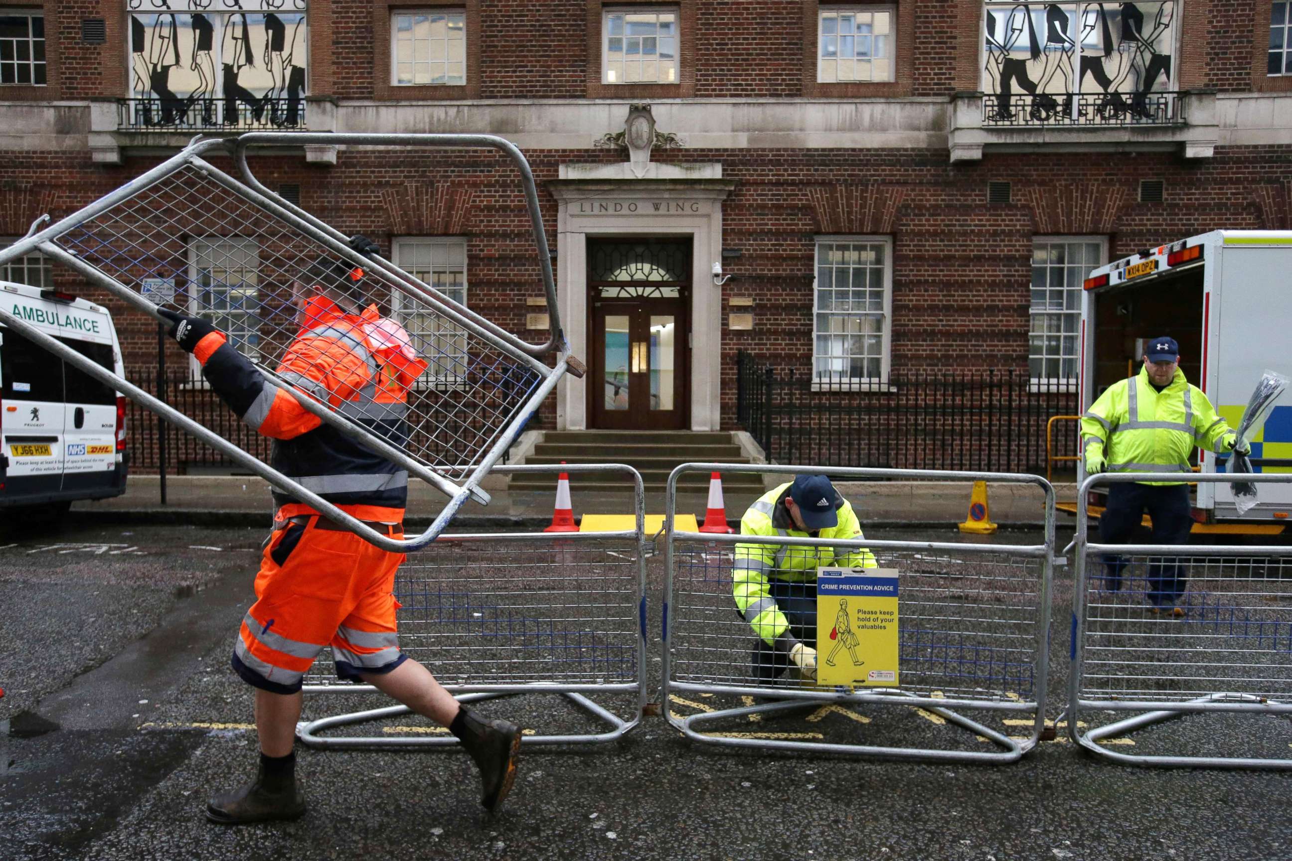 PHOTO: Crowd barriers are opposite the private Lindo Wing of St Mary's Hospital, in London, April 9, 2018.
