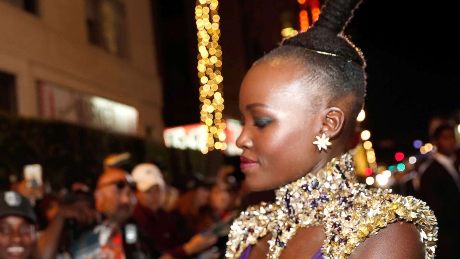 PHOTO: Lupita Nyong'o signs autographs at the Los Angeles World Premiere of Marvel Studios' Black Panther, at Dolby Theatre, Jan. 29, 2018 in Hollywood, Calif.