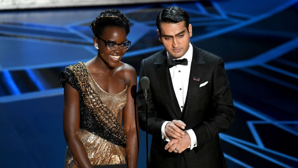 Actors Lupita Nyong'o and Kumail Nanjiani speak onstage during the 90th Annual Academy Awards at the Dolby Theatre at Hollywood & Highland Center, March 4, 2018, in Hollywood, California.