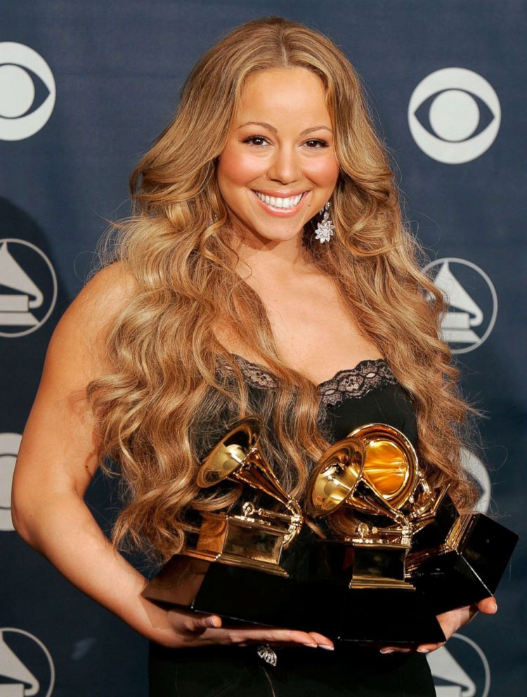 PHOTO: Singer Mariah Carey poses with her Best Female R&B Vocal Performance, Best Contemporary R&B Album and Best R&B Song awards in the press room at the 48th Annual Grammy Awards at the Staples Center in this Feb. 8, 2006 file photo in Los Angeles.