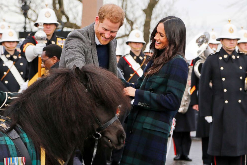 PHOTO: Britain's Prince Harry and his fiancee Meghan Markle meet a Shetland Pony as they arrive at Edinburgh Castle in Edinburgh, Scotland, Feb. 13, 2018.