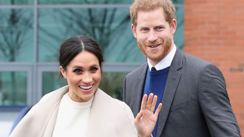 PHOTO: Prince Harry and Meghan Markle depart from Catalyst Inc, Northern Ireland's next generation science park, March 23, 2018, in Belfast, Northern Ireland.