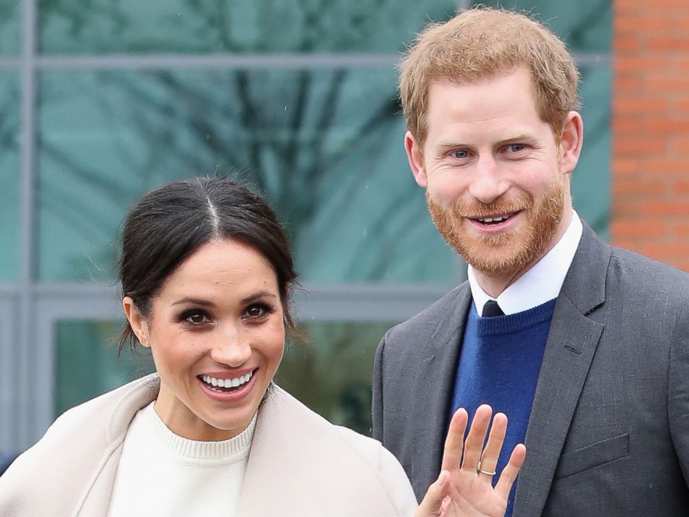 PHOTO: Prince Harry and Meghan Markle depart from Catalyst Inc, Northern Ireland's next generation science park, March 23, 2018, in Belfast, Northern Ireland.