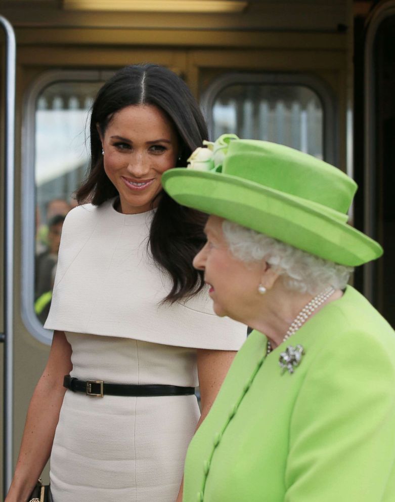 PHOTO: Queen Elizabeth II and Meghan, Duchess of Sussex arrive by Royal Train at Runcorn Station to open the new Mersey Gateway Bridge, June 14, 2018, in the town of Runcorn, Cheshire, England.