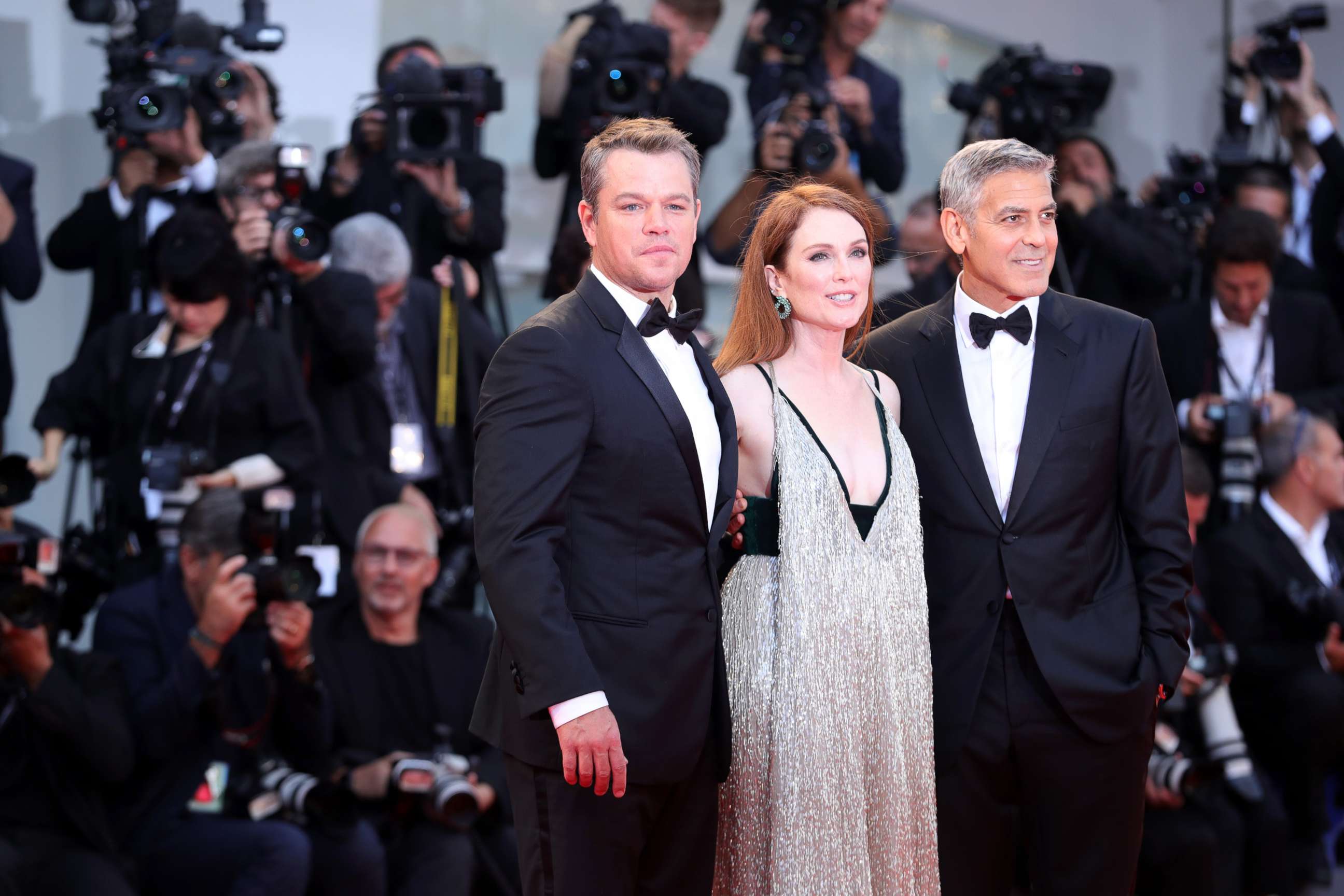 PHOTO: Matt Damon, Julianne Moore and George Clooney walk the red carpet ahead of the "Suburbicon" screening during the 74th Venice Film Festival at Sala Grande, Sept. 2, 2017 in Venice, Italy. 