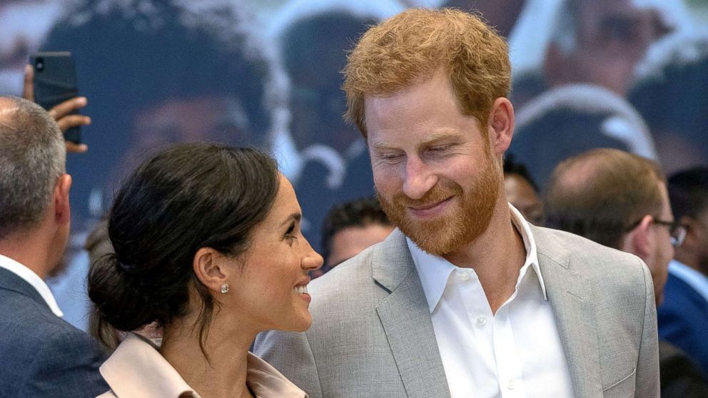 PHOTO: Prince Harry, Duke of Sussex and Meghan, Duchess of Sussex visit the Nelson Mandela Centenary Exhibition at Southbank Centre's Queen Elizabeth Hall on July 17, 2018 in London.
