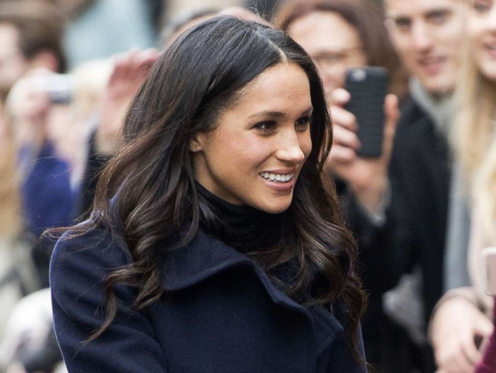 PHOTO: Meghan Markle greets the crowd as she and Prince Harry visit the Terrence Higgins Trust World AIDS Day Charity Fair in Nottingham, England, Dec. 1, 2017.