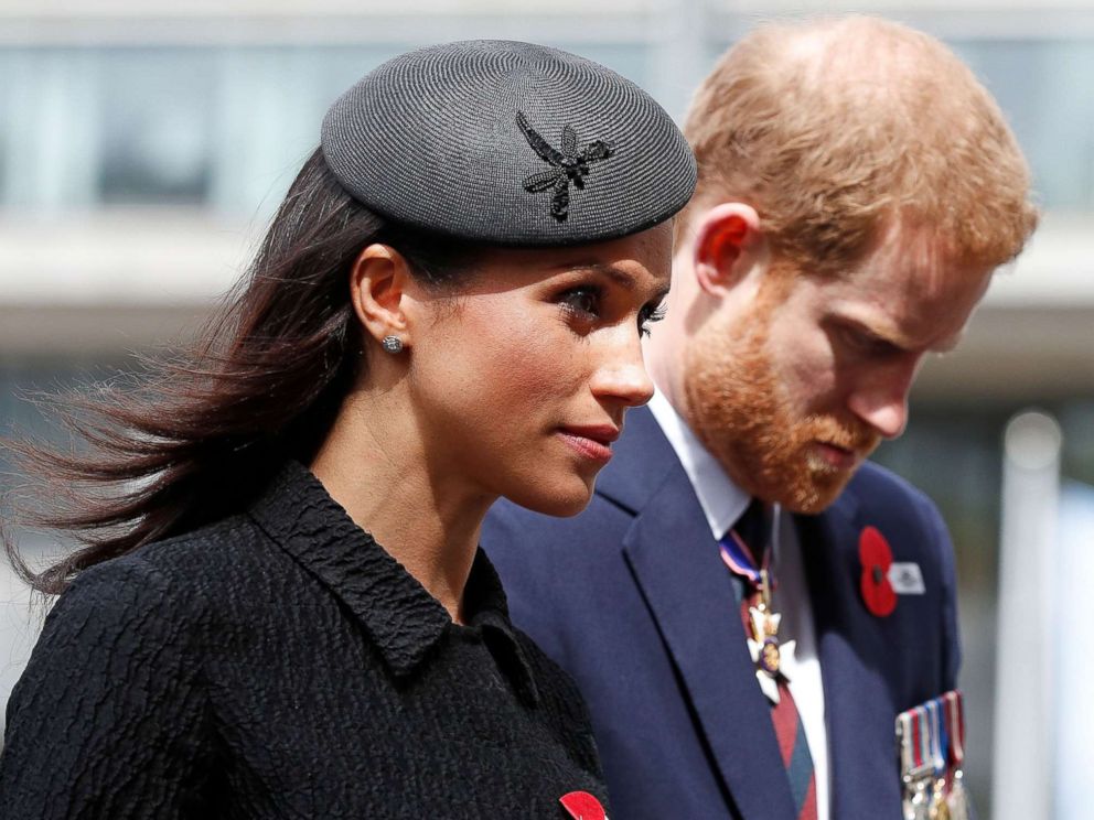 PHOTO: Britains Prince Harry and his fiancee Meghan Markle arrive to attend a service of commemoration and thanksgiving to mark Anzac Day in Westminster Abbey in London on April 25, 2018.