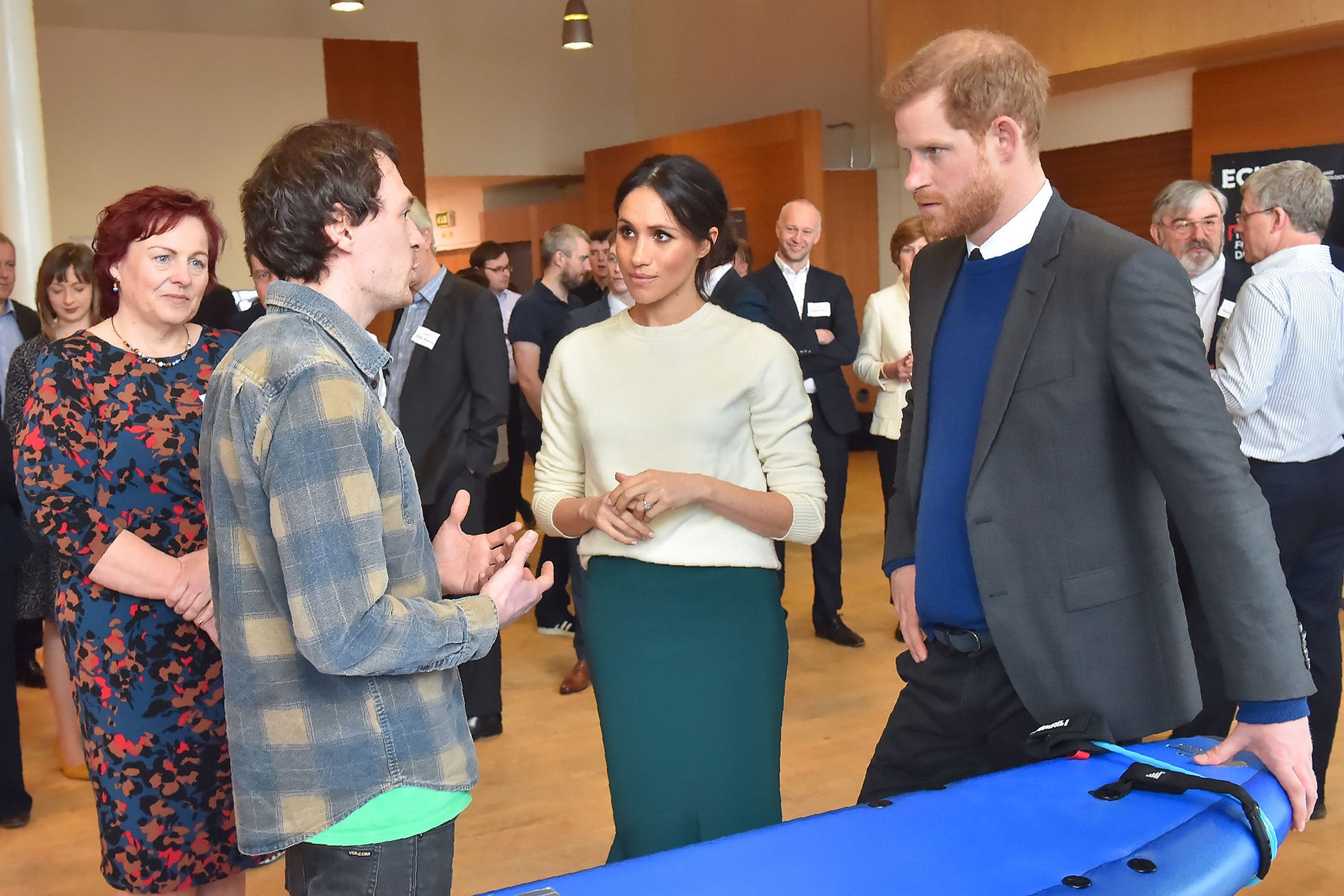 PHOTO: Britain's Prince Harry and his fiancee, U.S. actress Meghan Markle, speak with Chris Martin (2nd L), co-founder of Skunk Works during a visit to Northern Ireland's next generation science park, Catalyst Inc. in Belfast, Ireland, March 23, 2018.