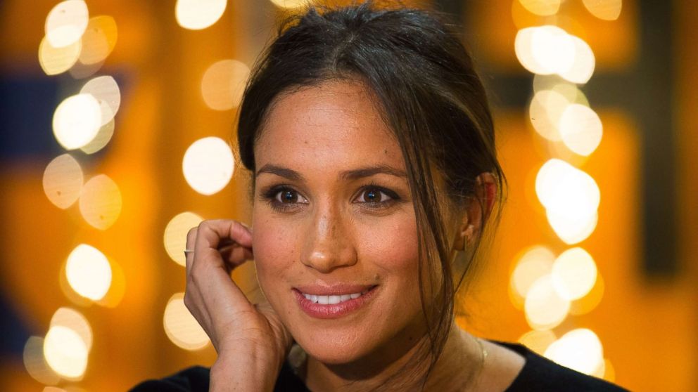 Prince Harry's fiance actress Meghan Markle gestures during a visit to Reprezent 107.3FM radio station in Brixton, England Jan. 9, 2018.