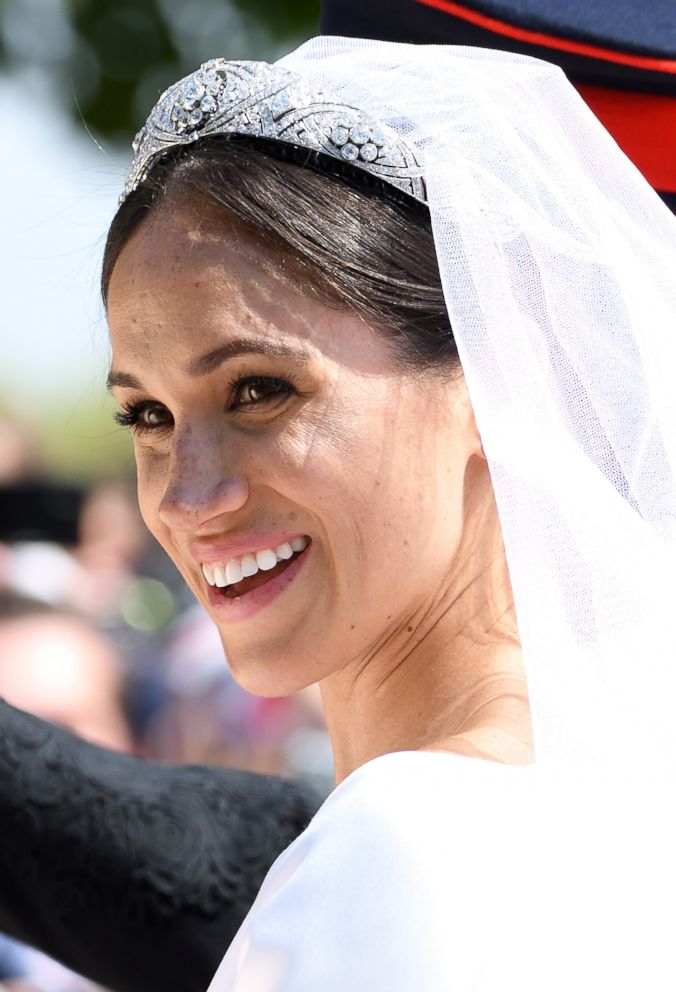 PHOTO: Meghan, Duchess of Sussex leaves Windsor Castle in the Ascot Landau carriage during a procession after getting married at St Georges Chapel on May 19, 2018 in Windsor, England.