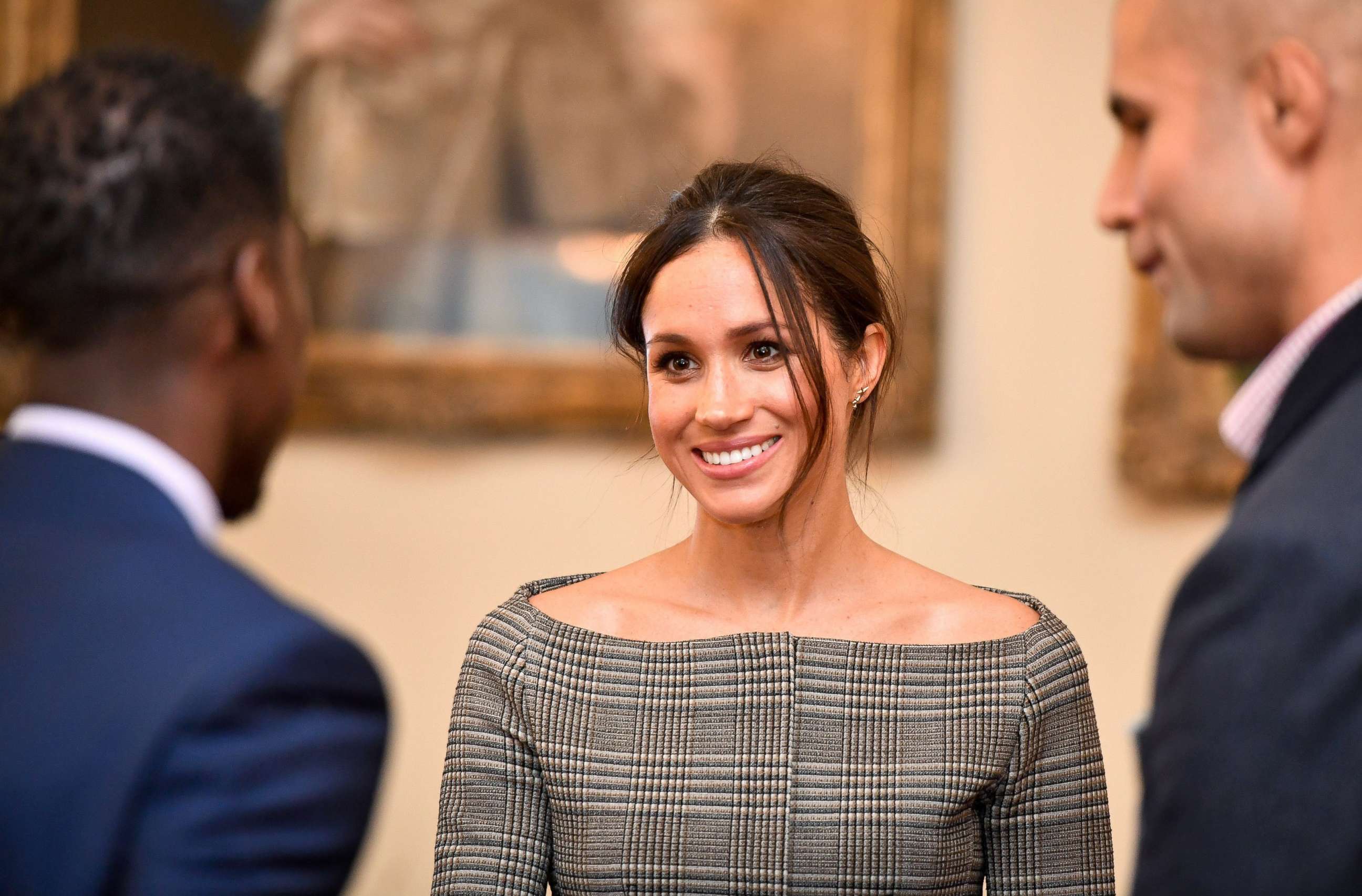 PHOTO: Meghan Markle chats with people inside the Drawing Room during a visit to Cardiff Castle, Jan. 18, 2018 in Cardiff, Wales. 