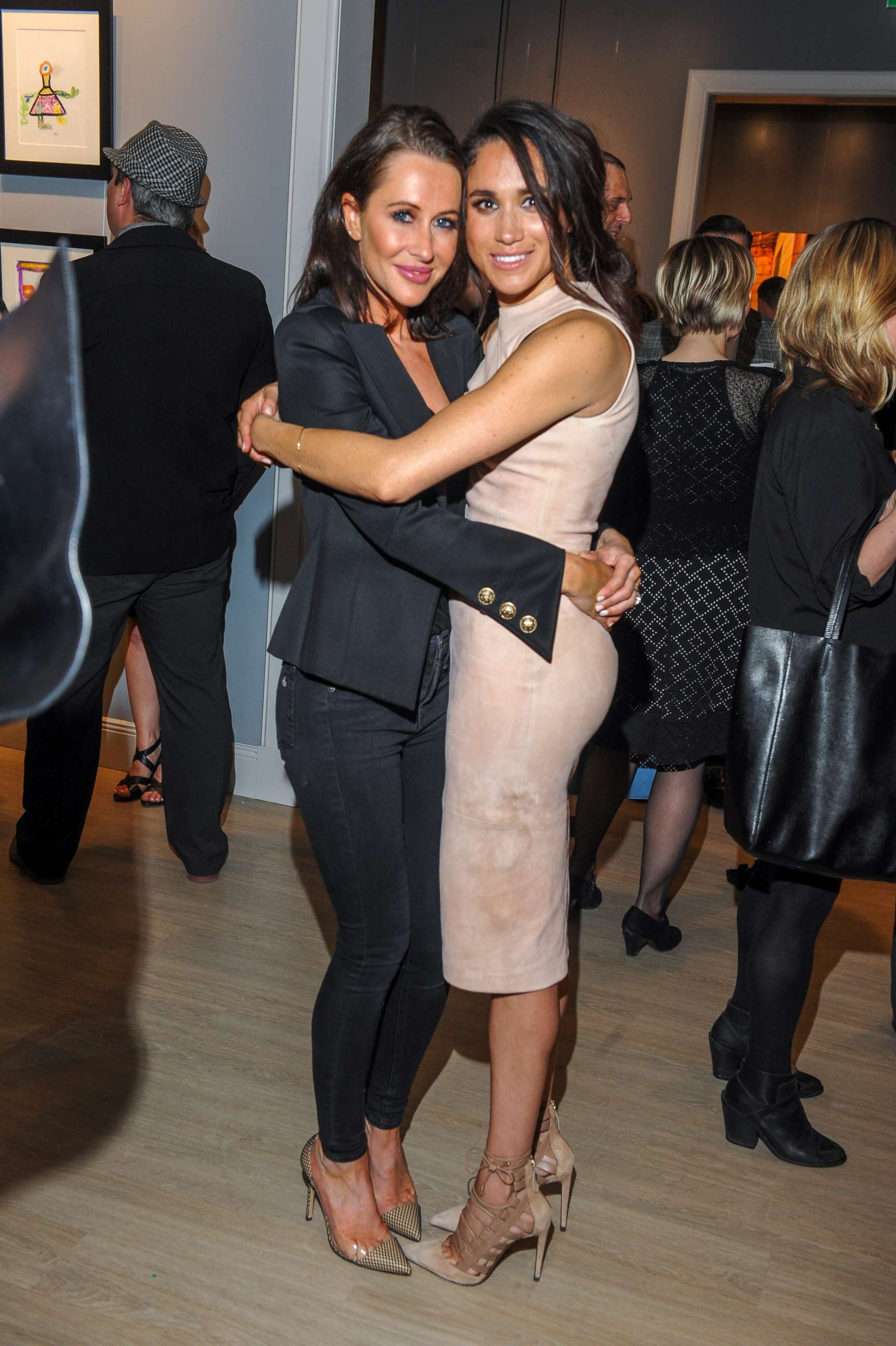 PHOTO: Jessica Mulroney and Meghan Markle attend the World Vision event held at Lumas Gallery on March 22, 2016 in Toronto.