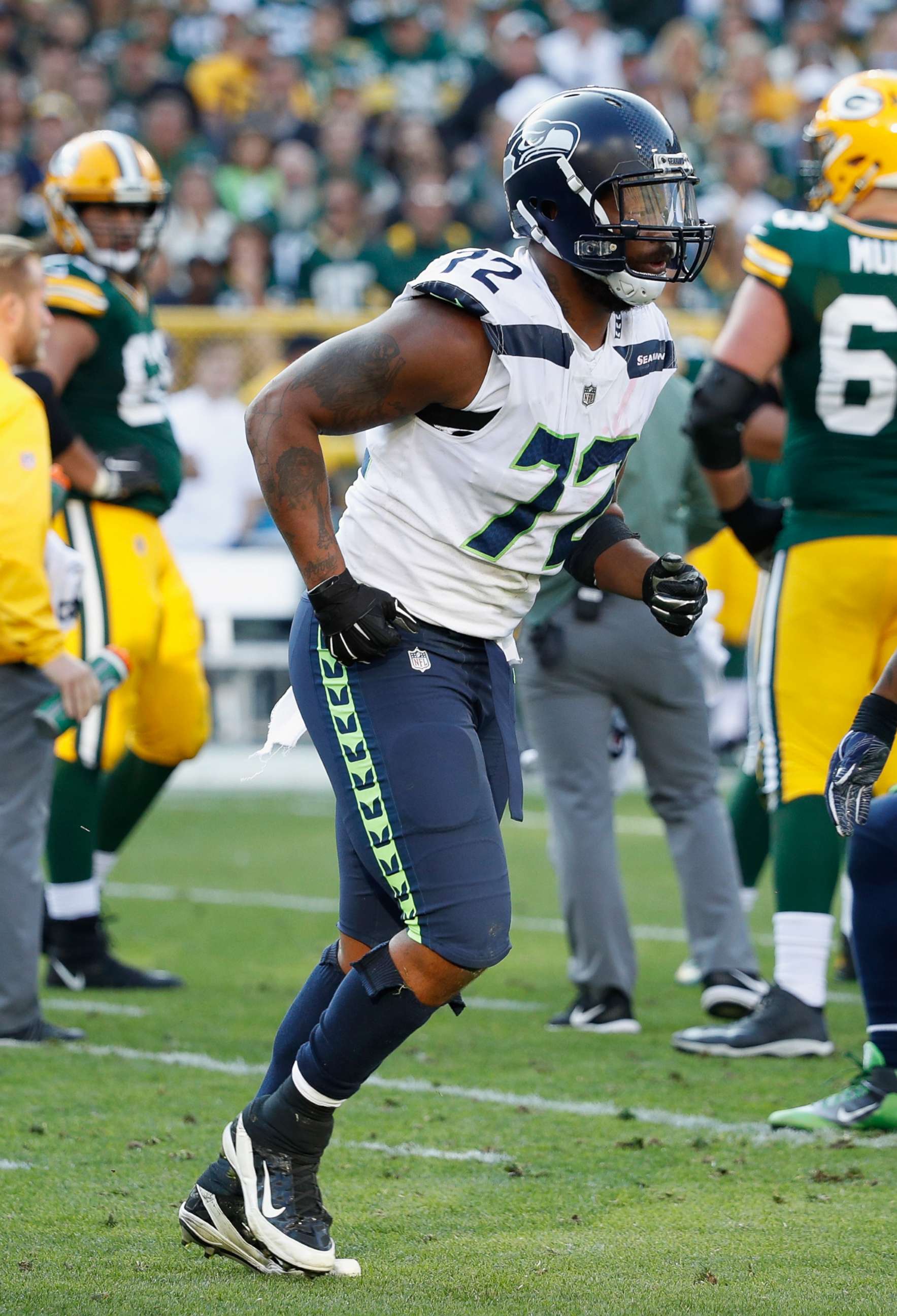PHOTO: Michael Bennett of the Seattle Seahawks walks off the field during the second half against the Green Bay Packers at Lambeau Field, Sept. 10, 2017, in Green Bay, Wis.