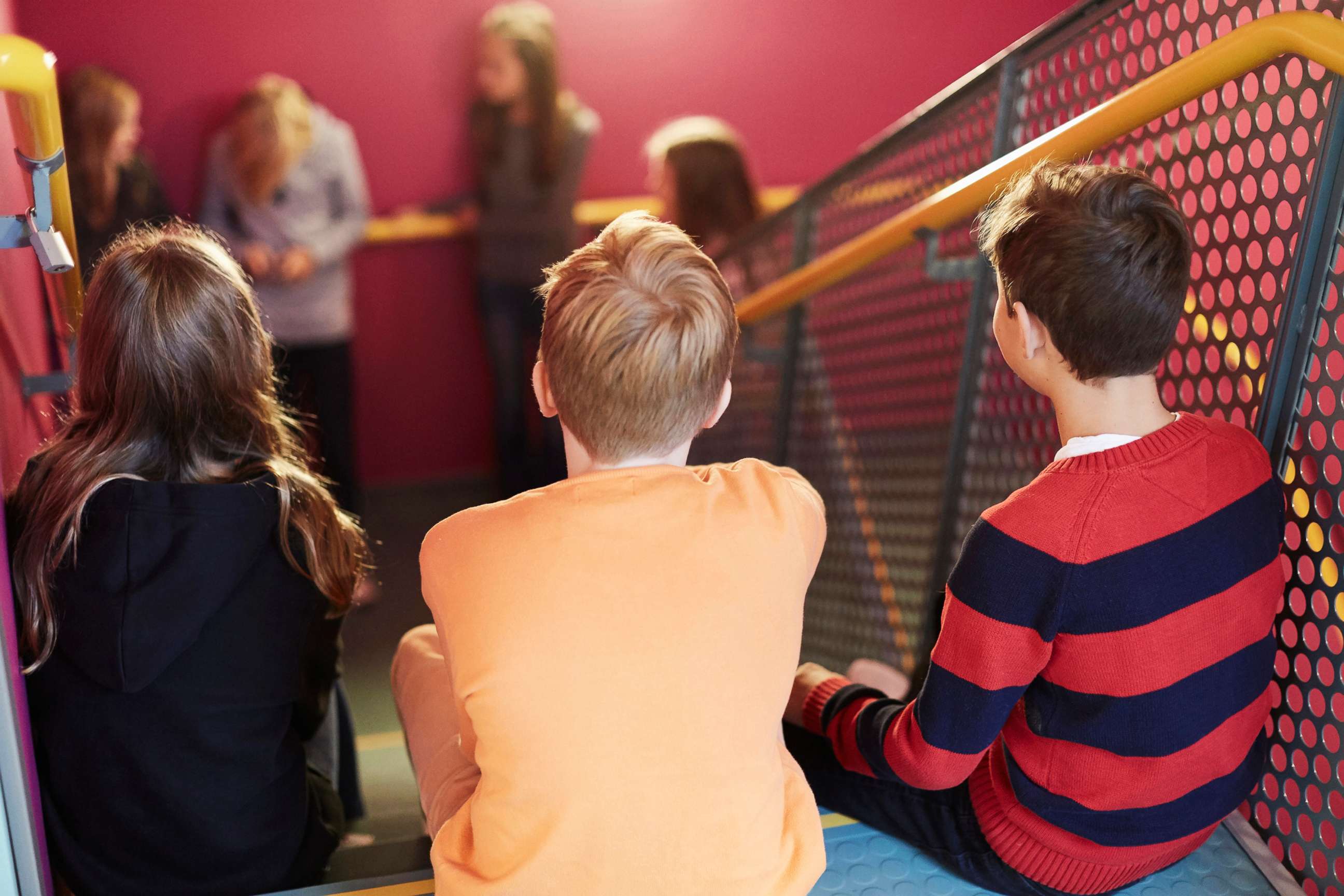 PHOTO: Middle-school aged students sit on a school stairwell in an undated stock photo.