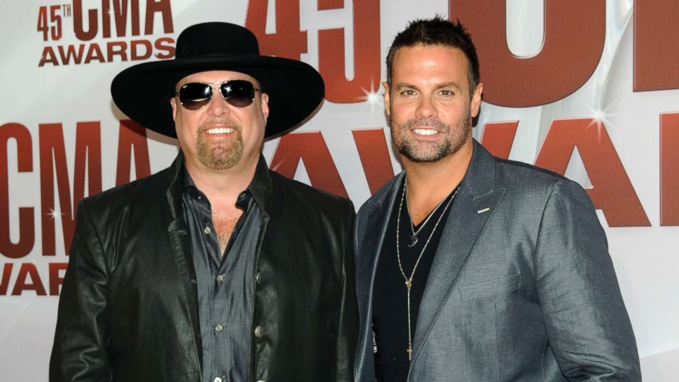 Eddie Montgomery, left, and Troy Gentry of Montgomery Gentry arrive at the 45th Annual CMA Awards in Nashville, Tenn., Nov. 9, 2011.  