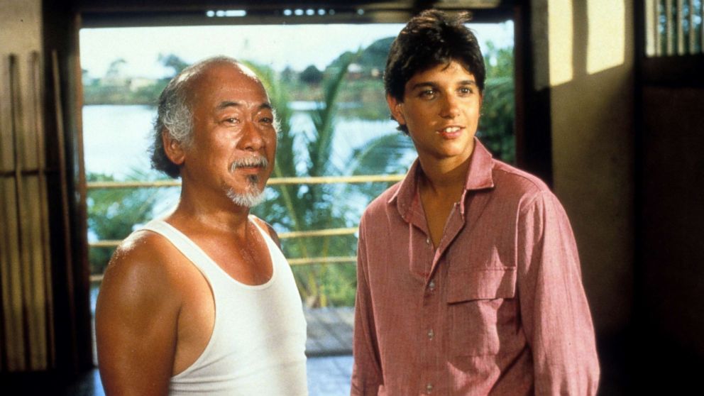 PHOTO: Pat Morita and Ralph Macchio in a scene from the film 'The Karate Kid', 1984. 