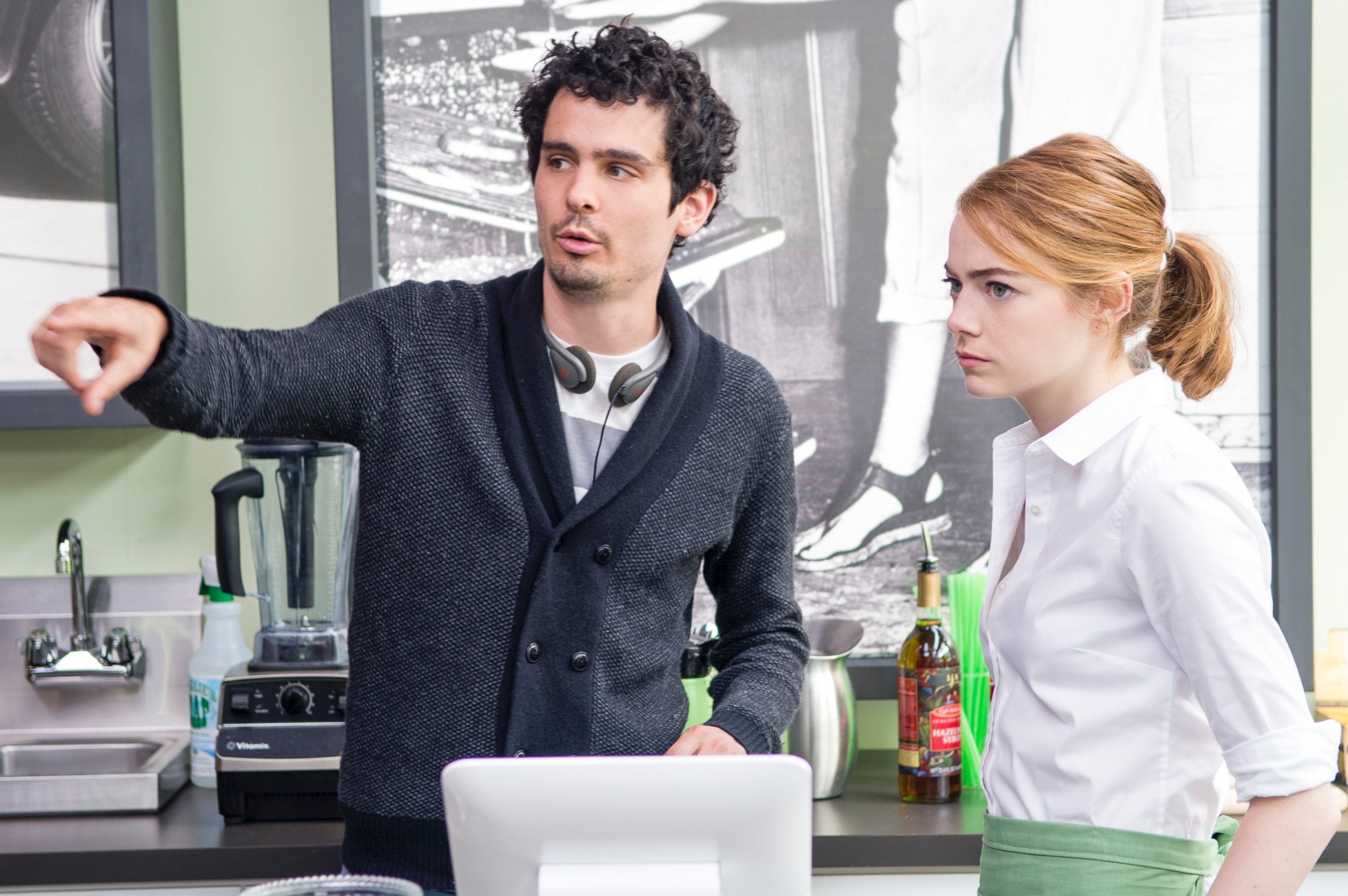 Damien Chazelle directs actress Emma Stone on the set of "La La Land."