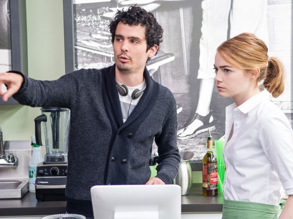 Damien Chazelle directs actress Emma Stone on the set of La La Land.