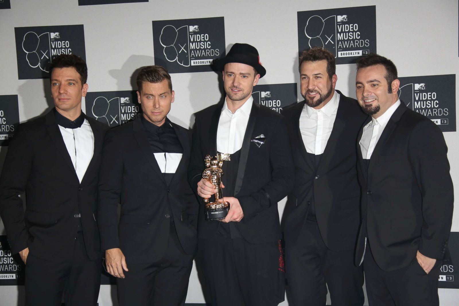PHOTO: Left to right; JC Chasez, Lance Bass, Justin Timberlake, Joey Fatone and Chris Kirkpatrick of reunited band 'N Sync pose in the press room of the MTV Video Music Awards at the Barclays Center in Brooklyn, Aug. 25, 2013.